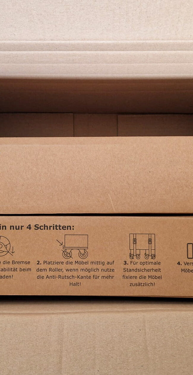 Verpackungen der Möbelroller in der Draufansicht im Karton.