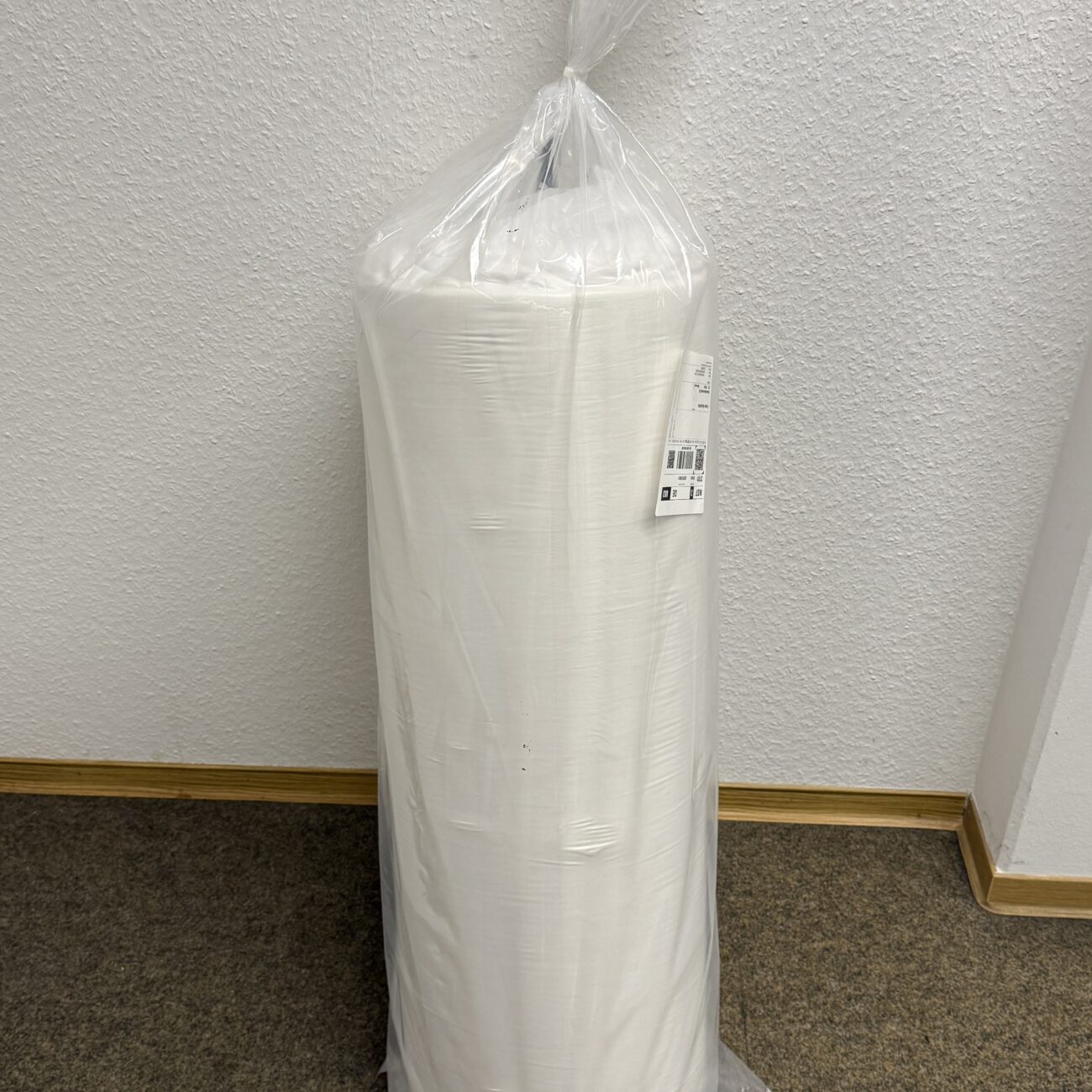 Eingepackte Kaltschaum-Matratze in Folie.