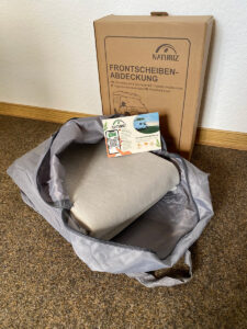 Frontscheibenabdeckung-Verpackung-geoeffnete-Tasche